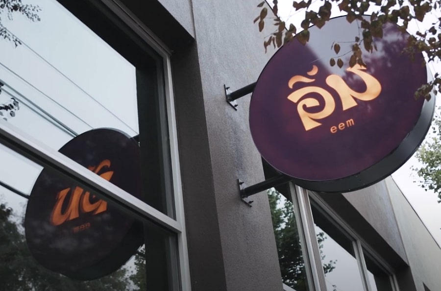 A sleek and stylish signboard for Eem, a restaurant celebrated for its unique Thai BBQ 